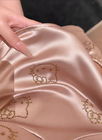 Pink silk hello kitty pyjamas